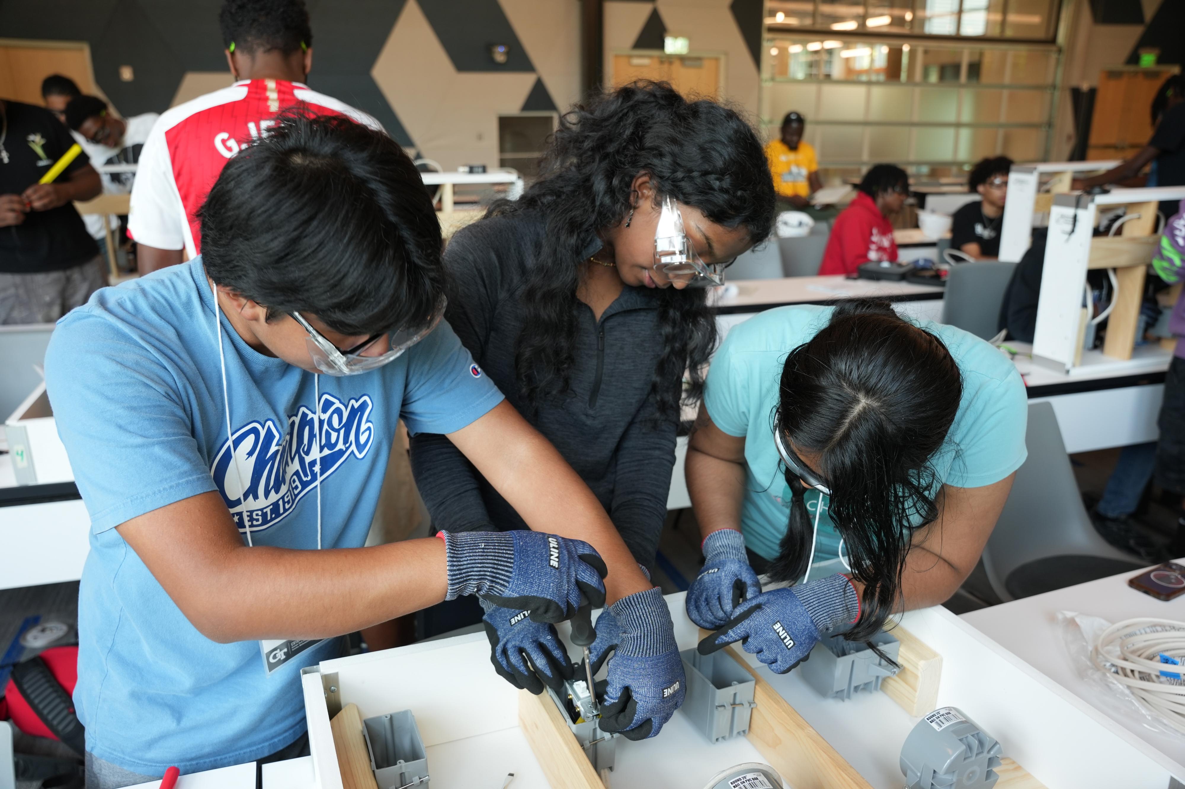 Students working on electrical circuit project