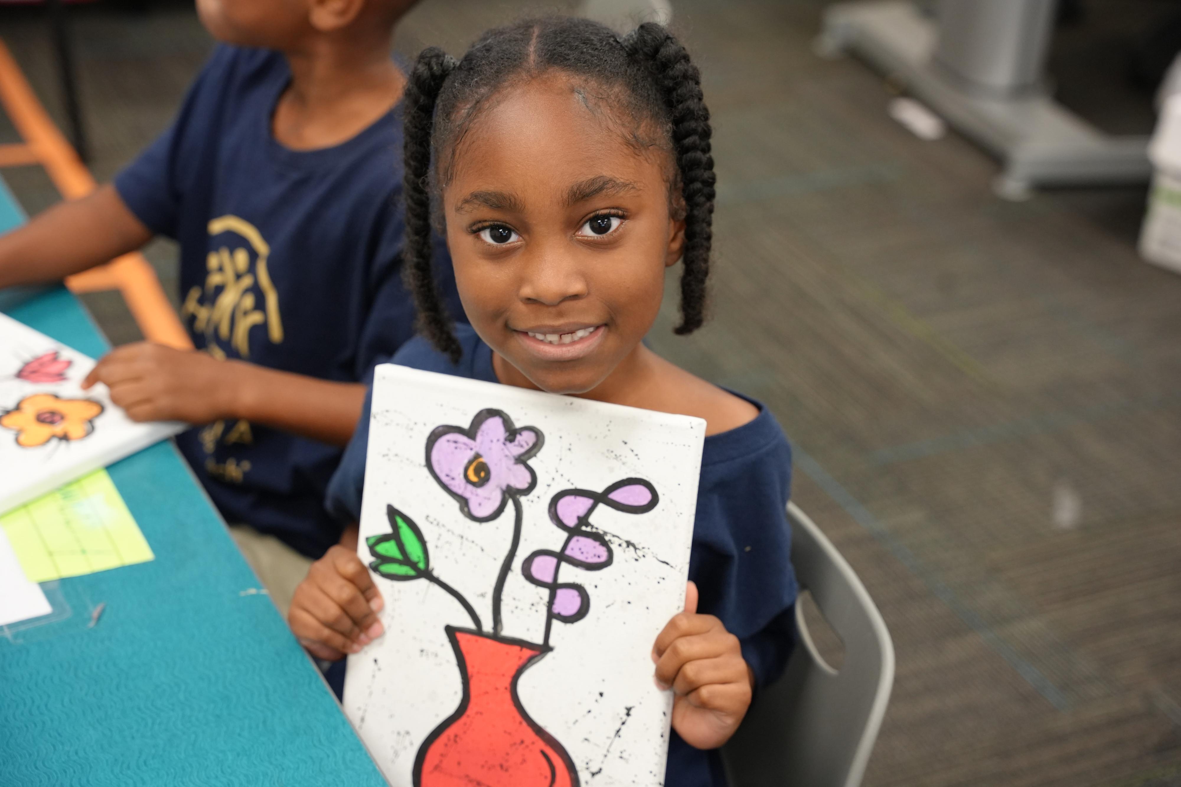 Horizons student showcasing artwork