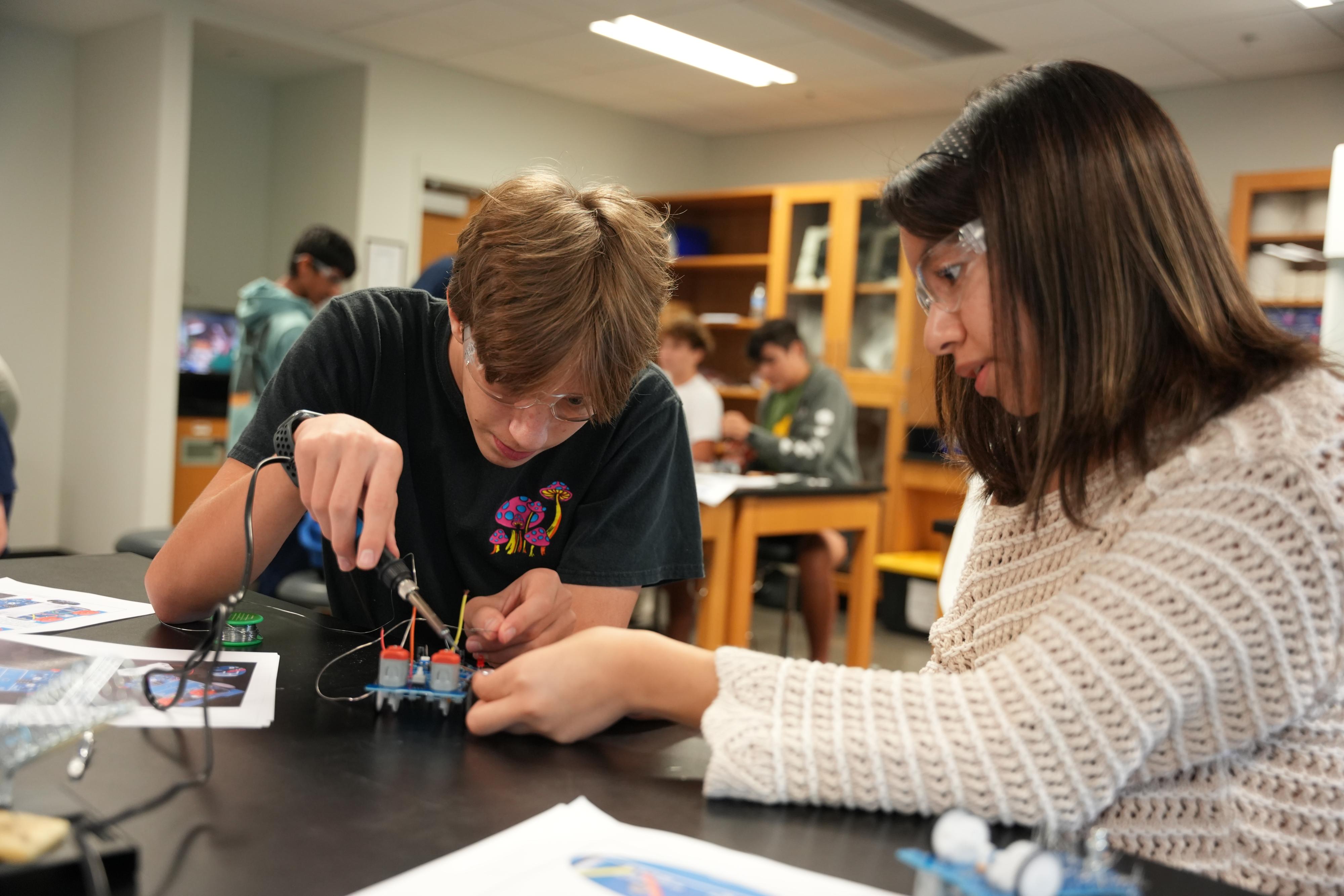 High school students working in lab